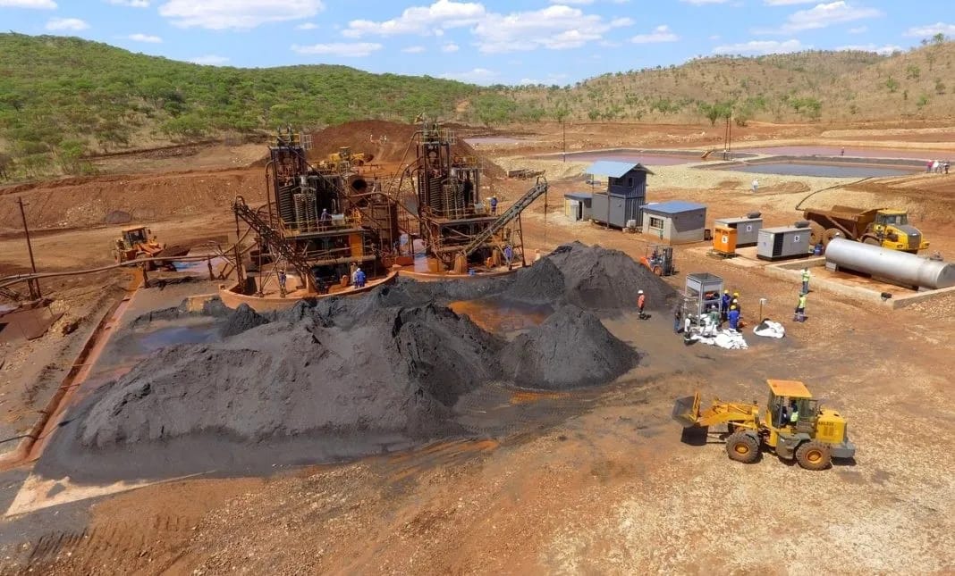 Mineral processing site with equipment and stockpiles